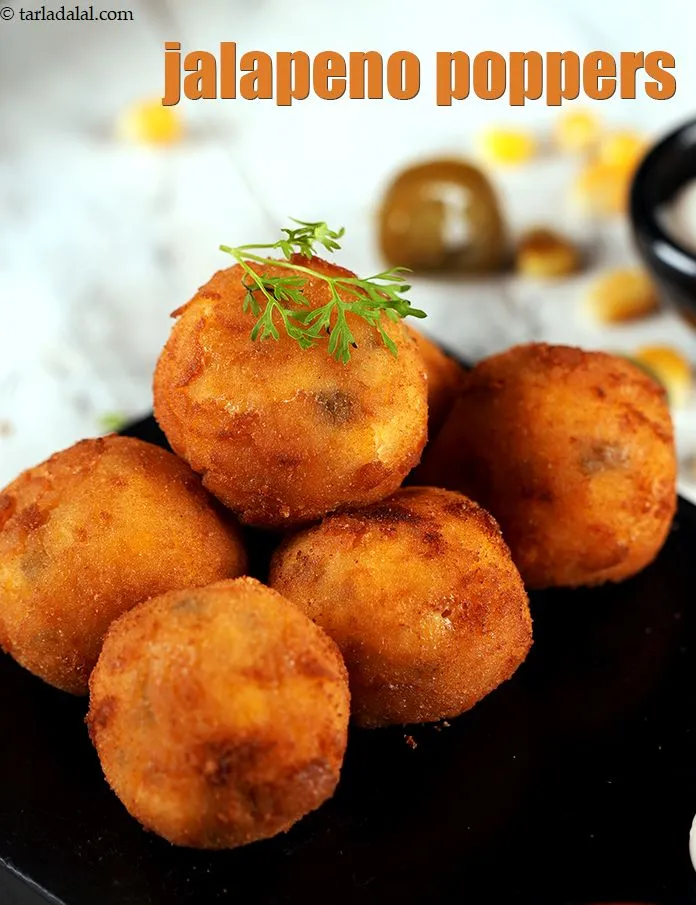 Step 24 – Serve<strong> corn cheese and jalapeno&nbsp;balls&nbsp;</strong>immediately with <a href="https://www.tarladalal.com/glossary-tomato-ketchup-tomato-sauce-181i">tomato ketchup</a>.