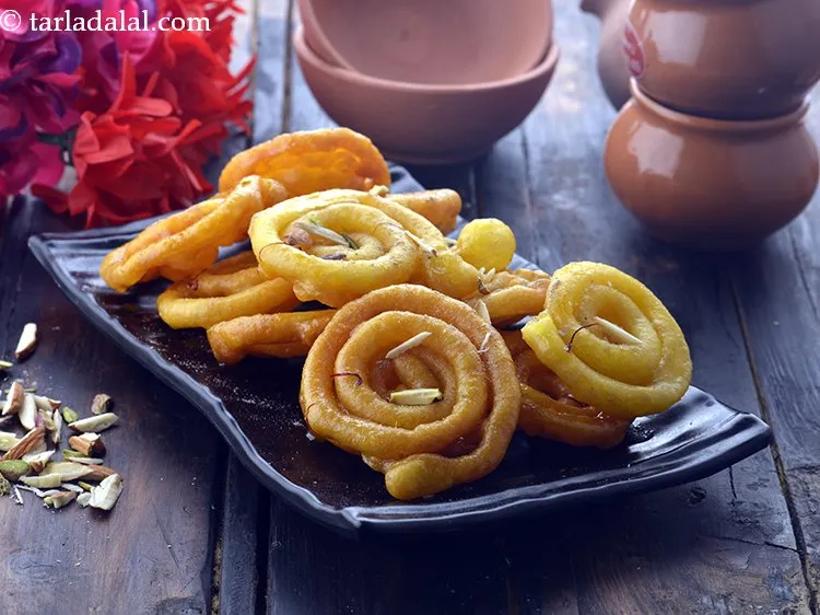 Step 28 – Remove the j<strong>alebi recipe | crispy homemade jalebi | halwai style Indian jalebi | instant …