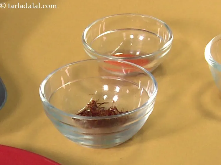 Step 13 – Place 1 tsp of warm crushed saffron in a small bowl. You can microwave the …