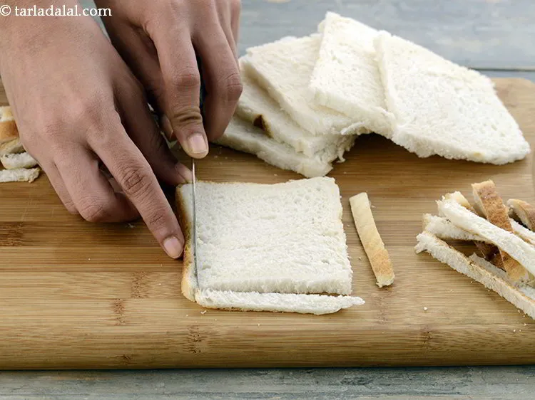 Step 11 – Place the bread on a chopping board and trim the sides of all the bread …