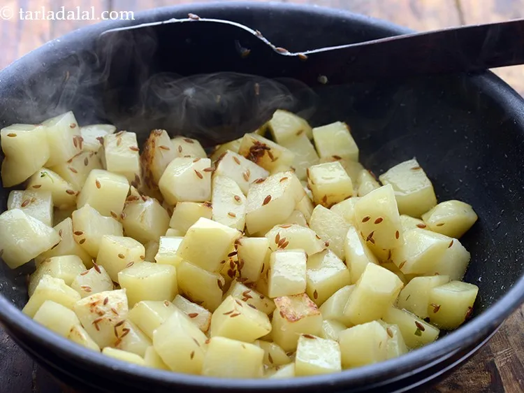 Step 7 – Cook on a medium flame for 10 to 12 minutes or until potatoes are cooked, …