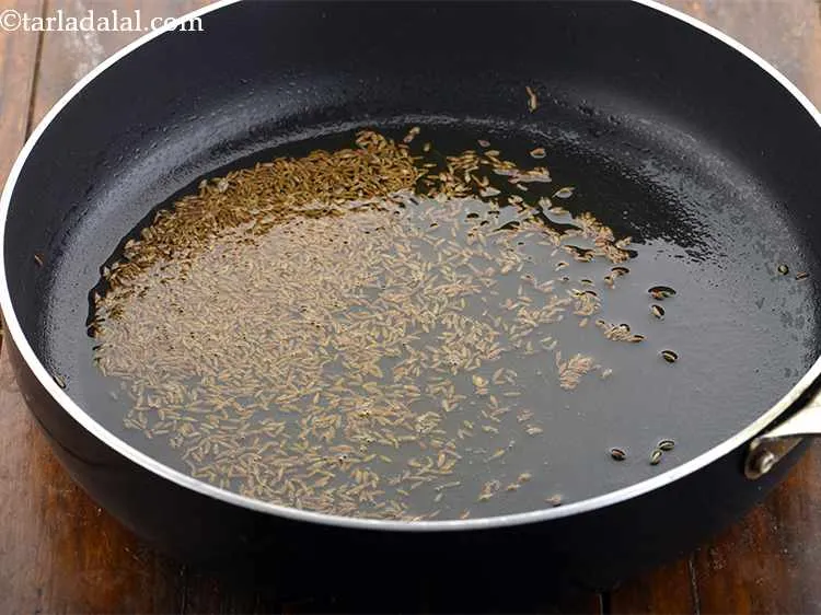 Step 10 – Only when the ghee is hot, add the cumin seeds and they will crackle immediately. …