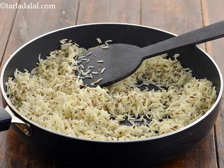 Step 12 – Saut&eacute; the rice for 5 minutes. Do not stir it much or else the grains …
