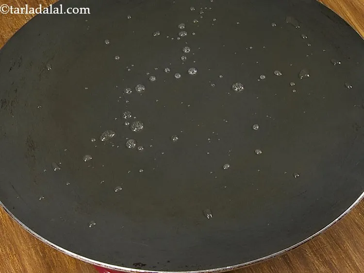 Step 10 – Sprinkle a little water on it (it should sizzle immediately).