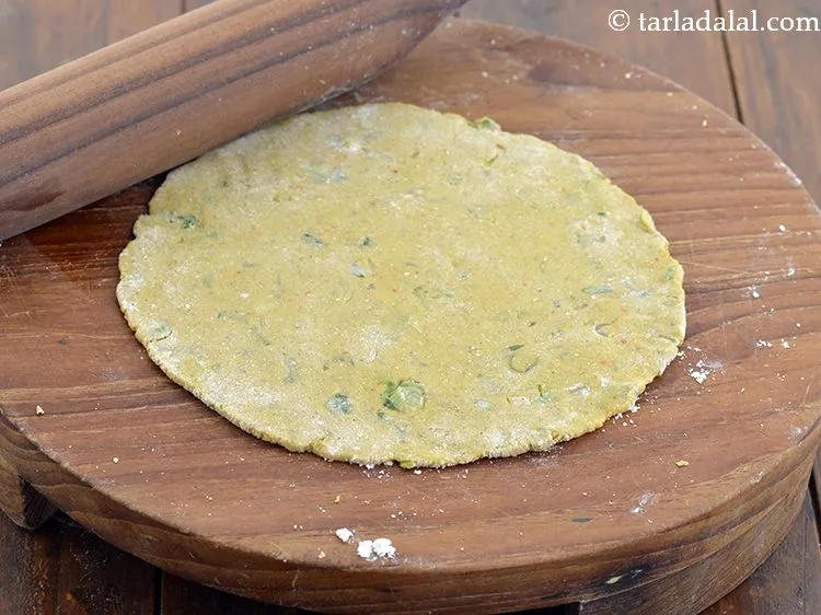 Step 16 – Roll out a portion of the dough into a 125 mm. (5&rdquo;) diameter circle using …