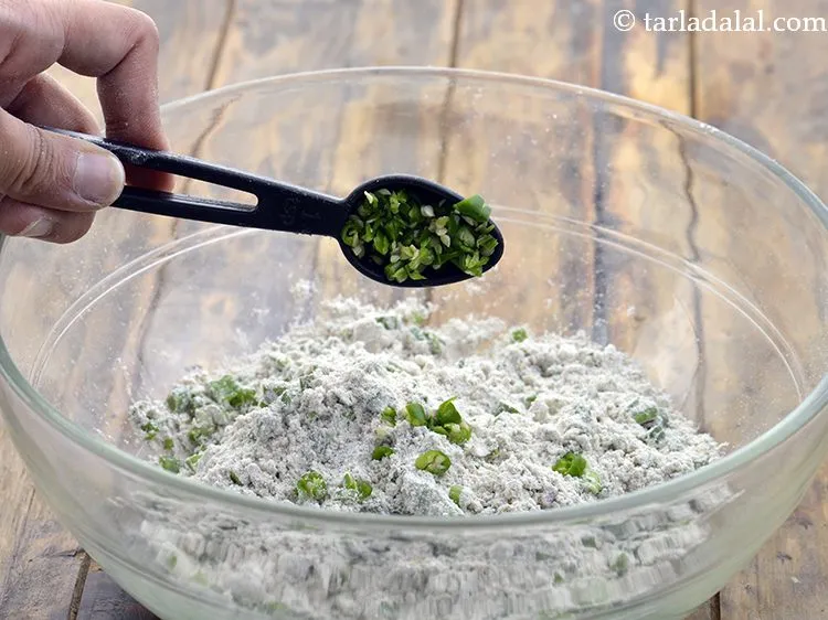 Step 5 – Add finely chopped green chillies. If you wish you can use green chilli paste too.