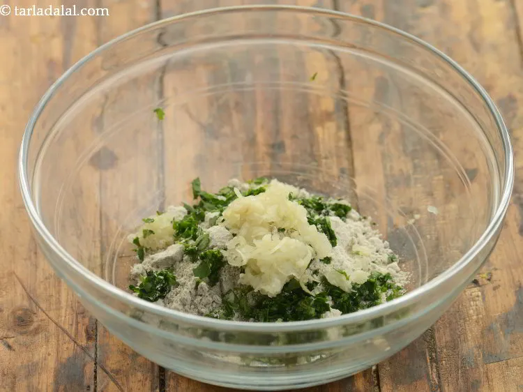 Step 10 – Add grated bottle gourd to it.