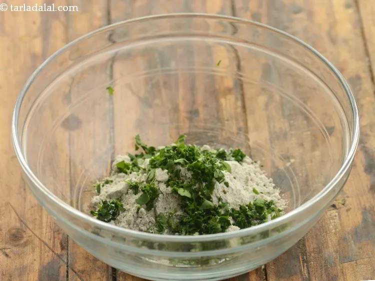 Step 9 – Wash and chop methi leaves. Add about a tbsp. of it.