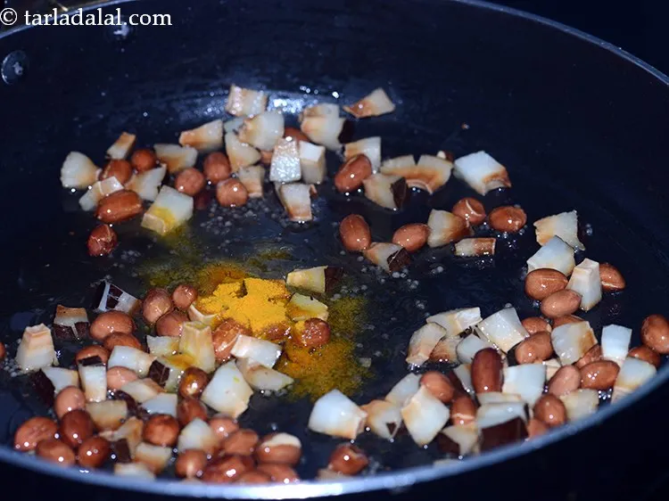 Step 10 – Add the turmeric powder.