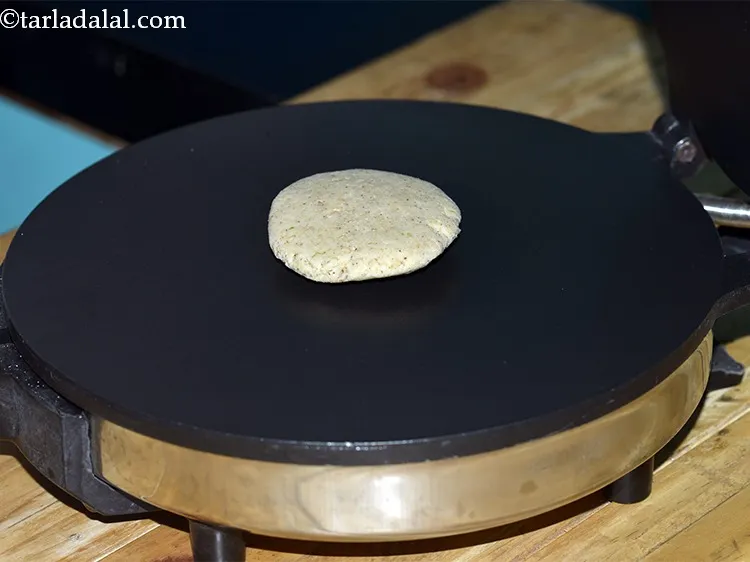 Step 35 – Place it in the centre of the pre-heated khakhra maker. There is no need to …