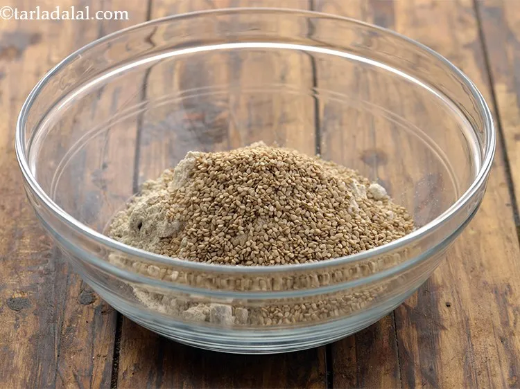 Step 4 – Add sesame seeds to the flour. The proportion of jowar flour to sesame seeds should …