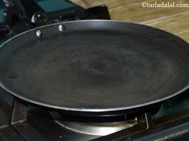 Step 13 – Heat a non-stick tava on a medium flame. This may take around 1 to 2 …