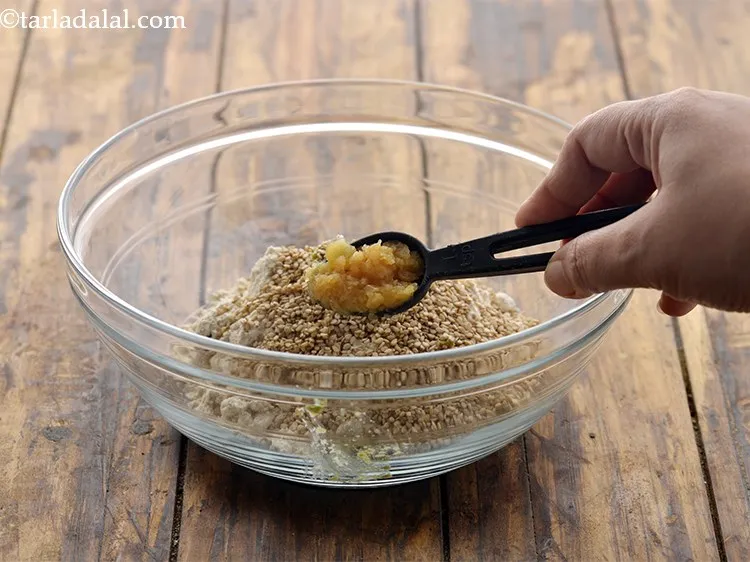 Step 7 – Add some garlic paste as well. This gives a nice garlicky flavours to the khakhra. …