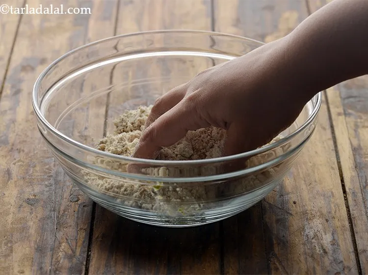 Step 29 – Mix all the ingredients for <strong>Jowar Khakhra with Til</strong> very well using your fingertips. This …