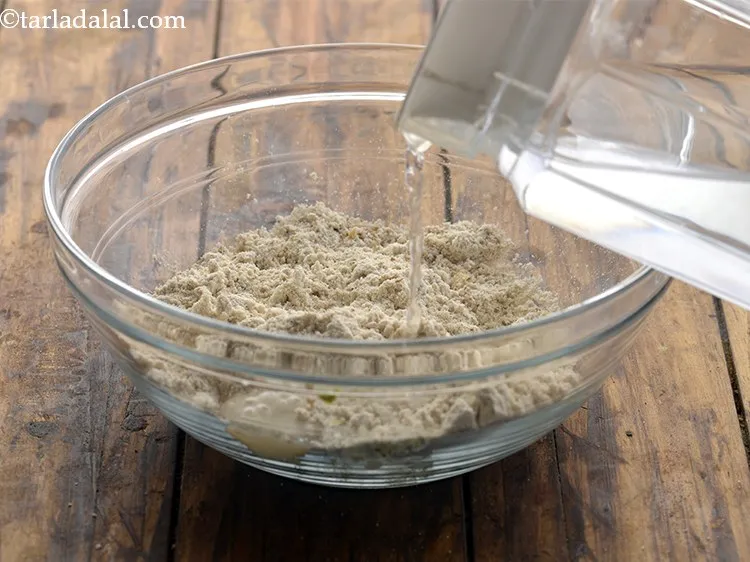 Step 30 – Add little water gradually for kneading the dough.&nbsp;