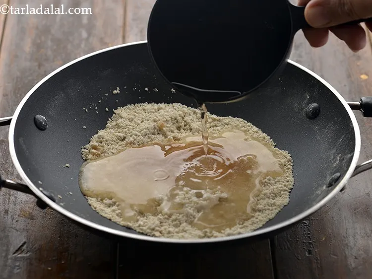 Step 14 – Add &frac34; cup of water. Adjust the quantity of water to get the porridge consistency. …