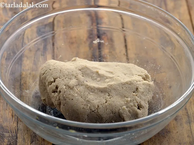 Step 12 – Add enough water and knead into a soft dough.