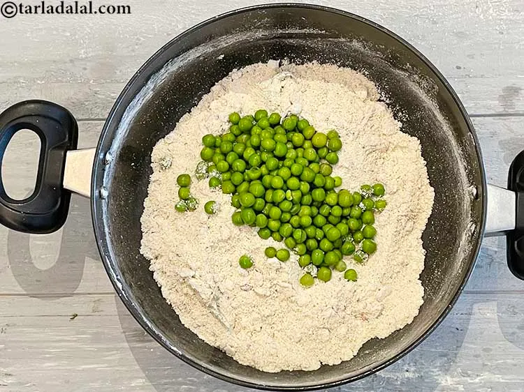 Step 13 – Add the green peas.