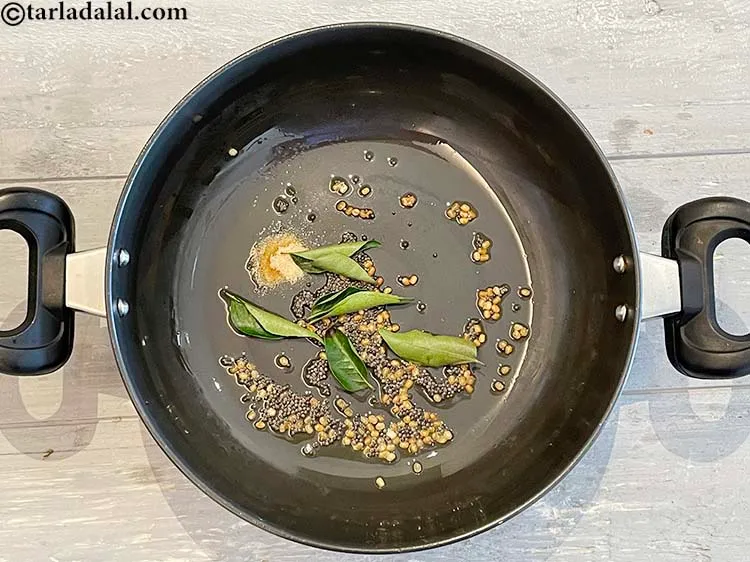 Step 5 – Add curry leaves.