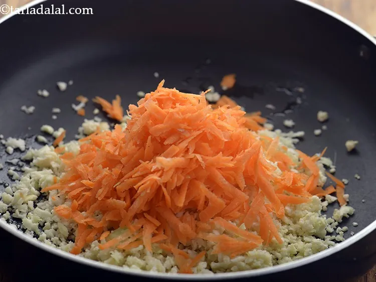 Step 16 – Add grated carrot.