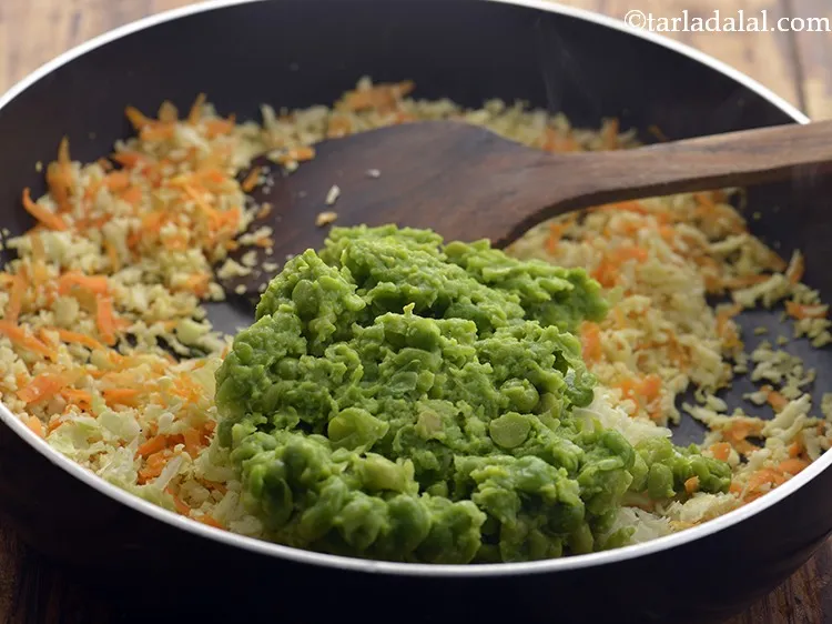 Step 19 – Add boiled green peas. These are for binding.