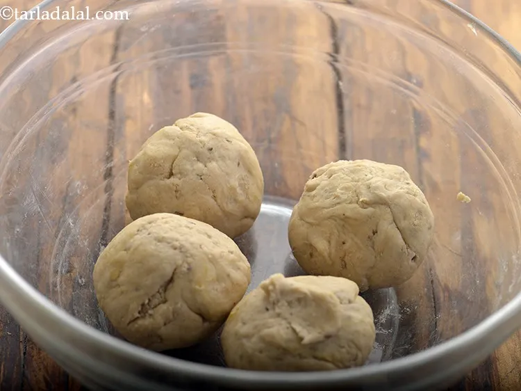 Step 8 – <div> Divide the dough into 4 equal portions.&nbsp;</div>