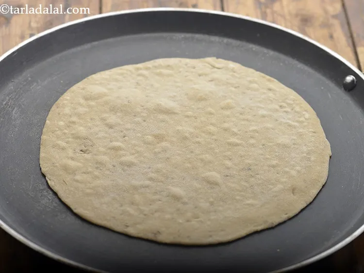 Step 11 – Flip it over and cook it on the other side also lightly.&nbsp;