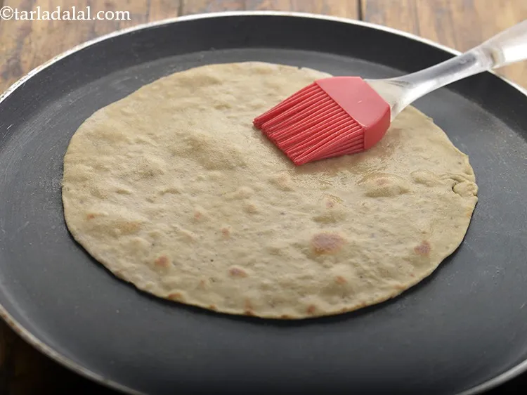 Step 12 – Flip again and cook till it turns golden brown in colour from both the sides …