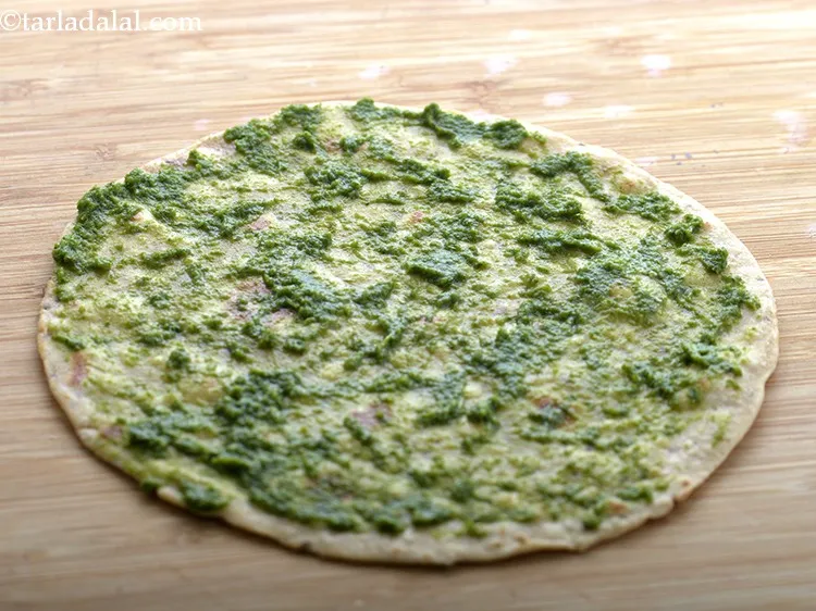 Step 27 – Spread 2 tsp of minty green chutney evenly over it. This chutney is for added …