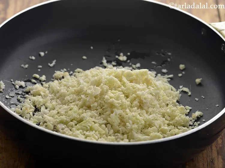 Step 15 – Add grated cauliflower to it.