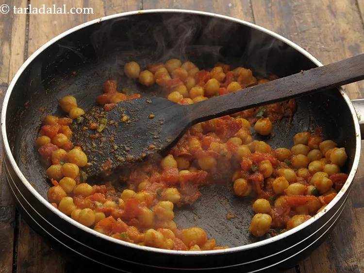 Step 24 – Mix well and cook on a medium flame for 1 minute, while stirring occasionally.