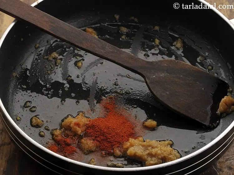 Step 16 – Add red chilli powder.&nbsp;