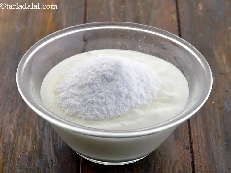 Step 17 – Add the powdered sugar to sweeten the curd.