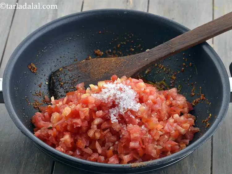 Step 12 – Add the sugar. This is added to balance the tanginess from tomatoes.&nbsp;