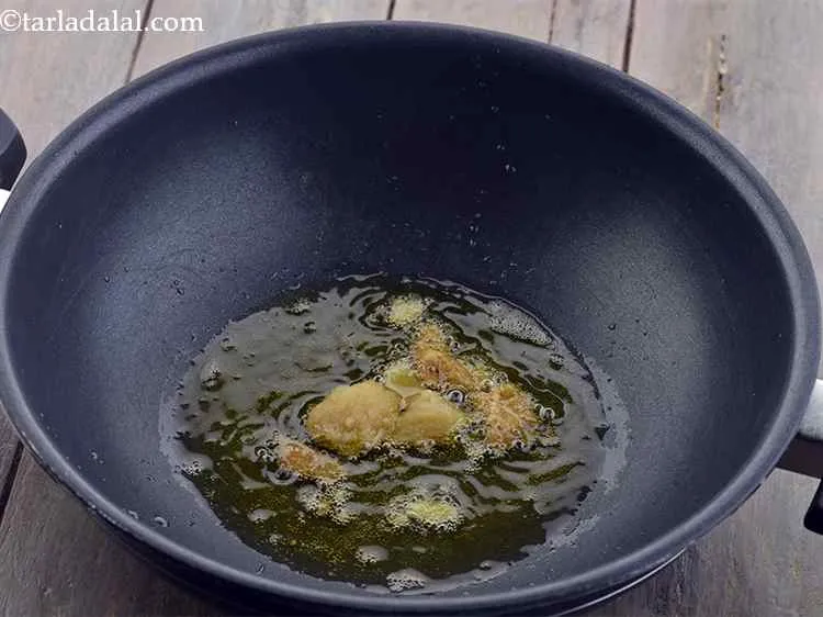 Step 5 – In a deep non-stick kadhai, add the ghee and allow it to heat up a …