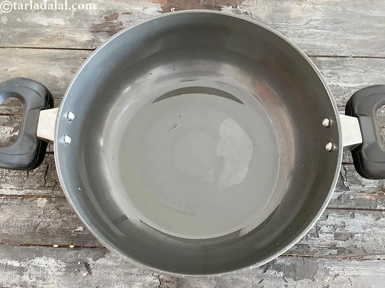 Step 5 – Heat 1 tsp ghee in a deep pan.