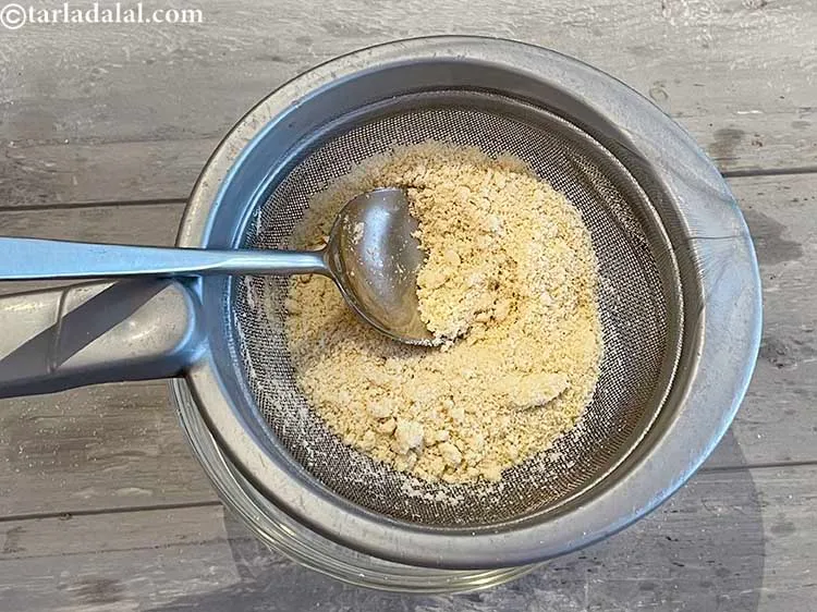 Step 5 – When sieving, you will need use a tablespoon to push the cashew powder through the …