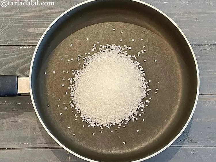 Step 7 – <meta charset="UTF-8" /> In a broad non stick pan add 1/2 cup&nbsp;sugar which is about …