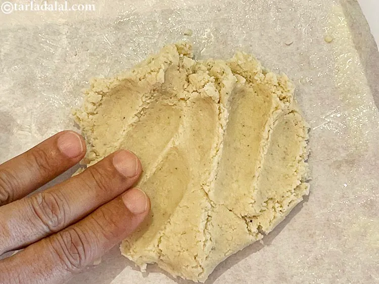 Step 17 – Allow the mixture to cool a bit. Grease your hands and then knead the warm …