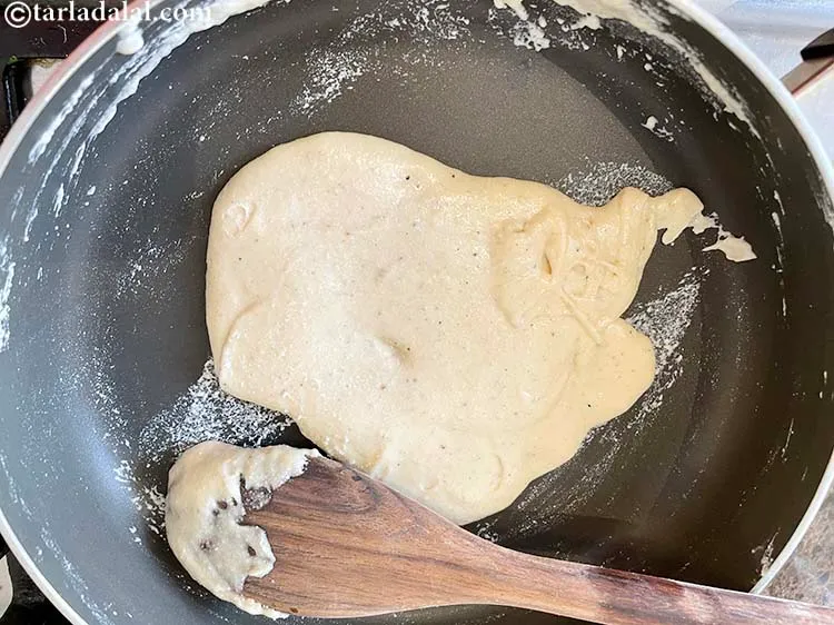 Step 14 – Cook and mix well till the mixture thickens and leaves the sides of the pan.