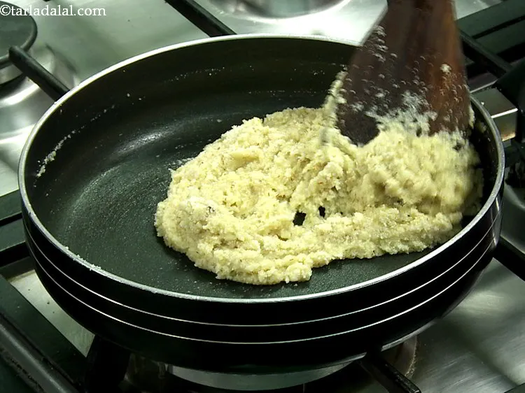 Step 20 – Cook on a medium flame for 5 minutes. Keep stirring the mixture of <strong>Kaju Badam …