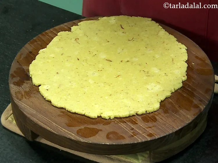 Step 29 – Using a greased rolling pin roll it into a 7&rdquo; diameter circle. Ensure you roll …