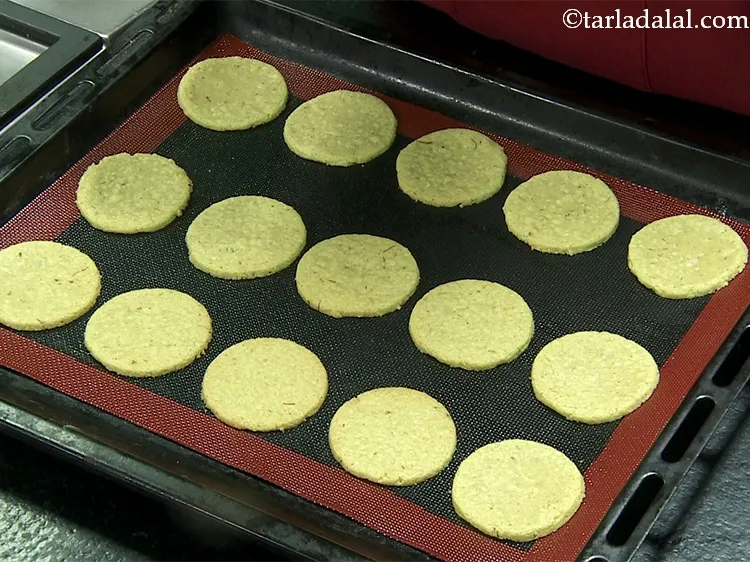 Step 34 – Bake the&nbsp;<strong>kaju puri | kaju badam puri | Indian mithai &ndash; kaju puri | cashew …