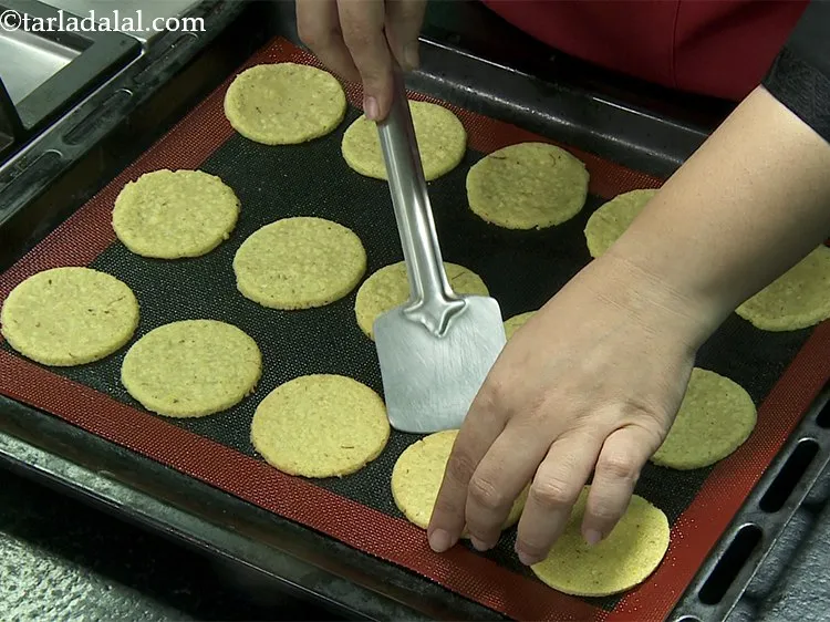 Step 36 – Flip the <strong>Kaju Badam Puris.</strong>