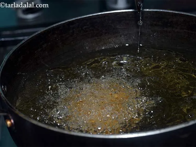 Step 24 – Put 1-2 pithas at a time into the hot oil. You can put more if …