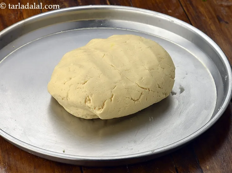 Step 14 – Continuing mixing till you get a dough. This will take around 2 to 3 minutes.&nbsp;