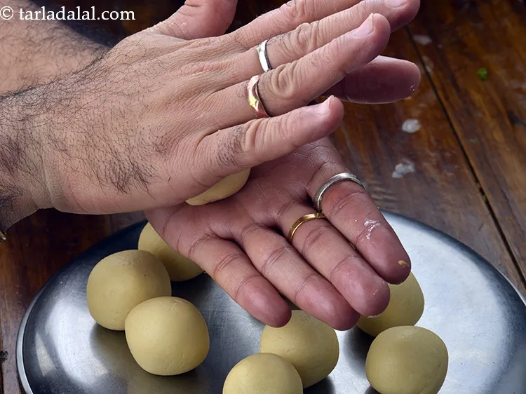Step 27 – Remember there should have no cracks on the surface while rolling kala jamuns, otherwise they …