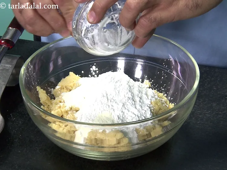 Step 12 – Add 3 tbsp&nbsp;<a href="https://www.tarladalal.com/glossary-arrowroot-flour-arrowroot-ka-atta-paniphal-flour-111i">arrowroot (paniphal) flour</a>.