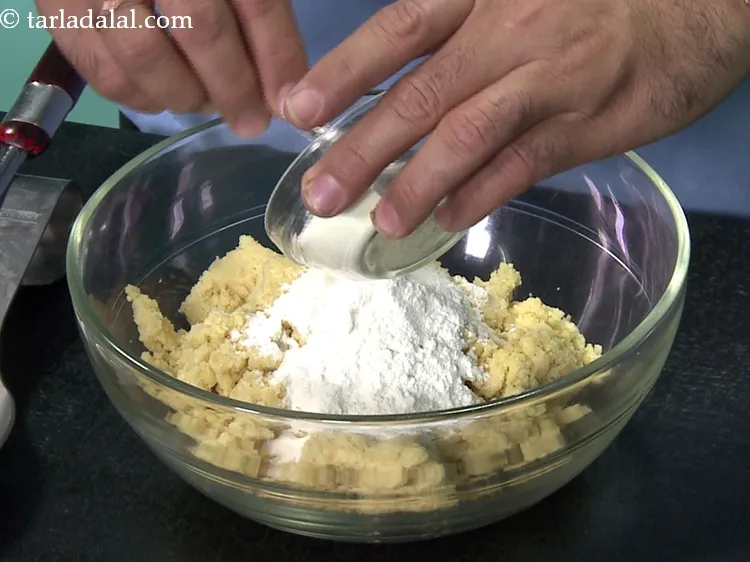 Step 11 – Add 3 tbsp&nbsp;<a href="https://www.tarladalal.com/glossary-milk-powder-517i">milk powder</a>.