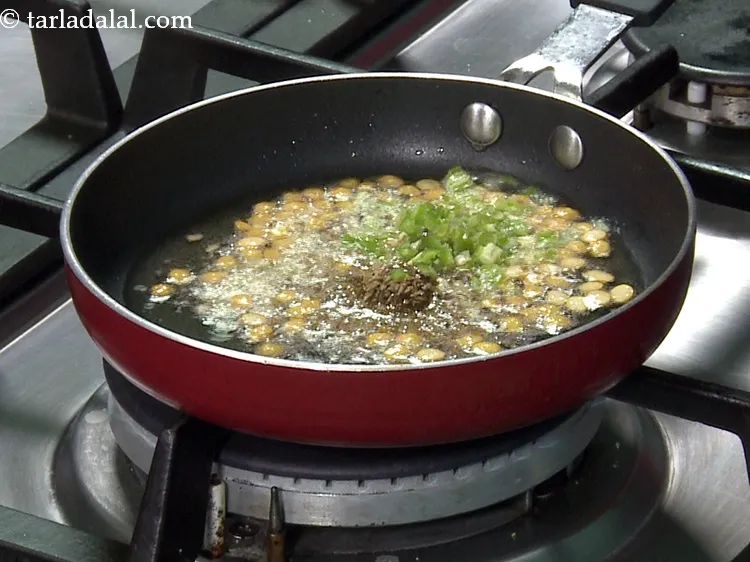 Step 41 – Add some finely chopped green chillies for spicy flavour.&nbsp;